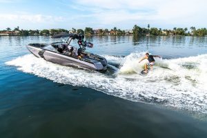 Ski boat with wakeboarder